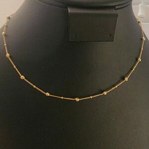 After Thoughts Elegant Gold Tone Necklace